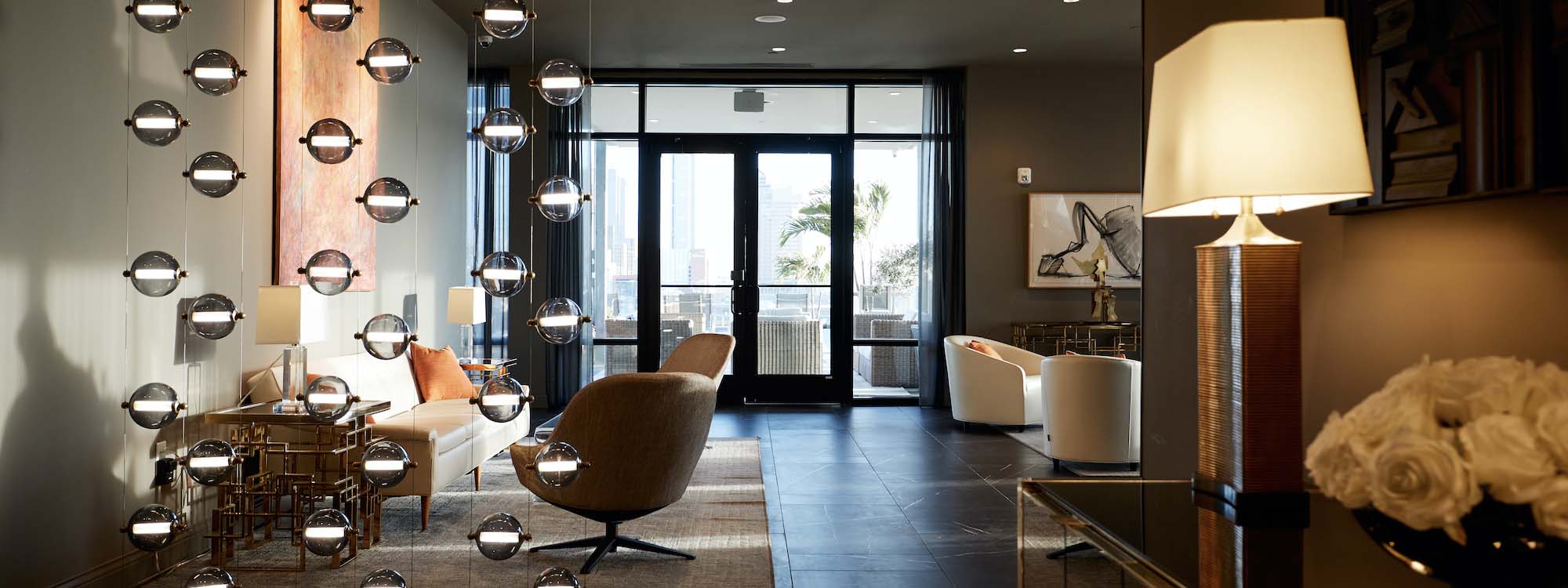 A hallway with a lot of lights hanging from the ceiling.